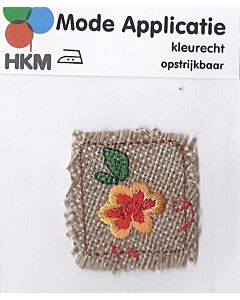 Linachtige stof met bloem applicatie