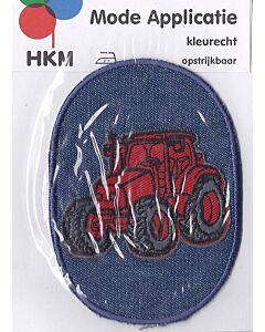 Rode tractor op spijkerstof applicatie.