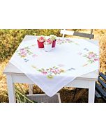 Bedrukte tafelkleed lentebloemen om te borduren.