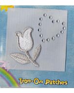 Tulp met zilver en wit en een hartje van strassteentjes. 